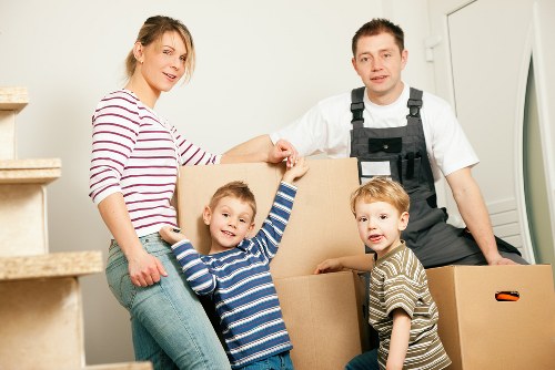 Boxes and furniture being prepared for Harrow removals at the start of a move