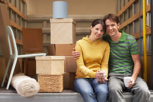 Professional movers handling furniture during a Harrow relocation