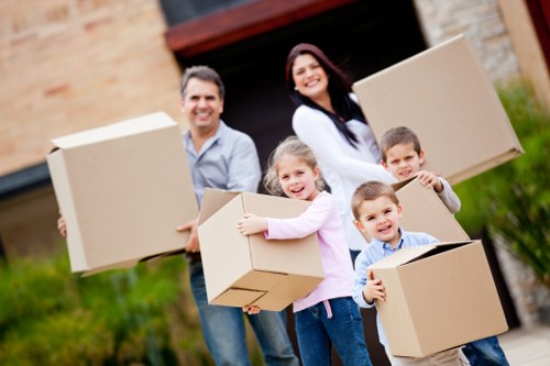 Unpacking boxes in a new Harrow home after relocation