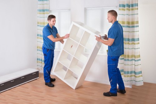 Unpacking boxes and arranging items in a new Harrow property