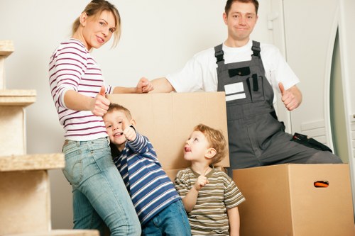 Trained movers handling belongings carefully during a relocation